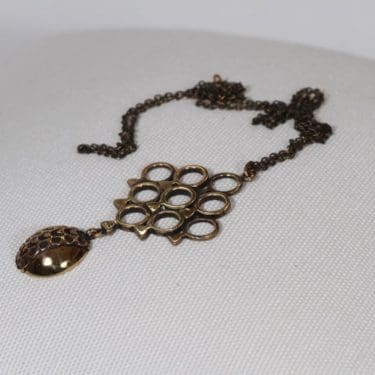 Turun hopea Lehti kaulakoru, pronssi, suunnittelija Pentti Sarpaneva, pronssi