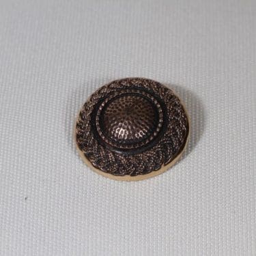 Turun hopea Punos rintakoru, pronssi, suunnittelija Pentti Sarpaneva, pronssi