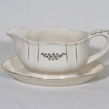 Arabia Irja kastikekaadin, suunnittelija , painokoriste, kultakoriste