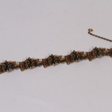 Turun Hopea 2168 rannekoru, pronssi, suunnittelija Pentti Sarpaneva, pronssi