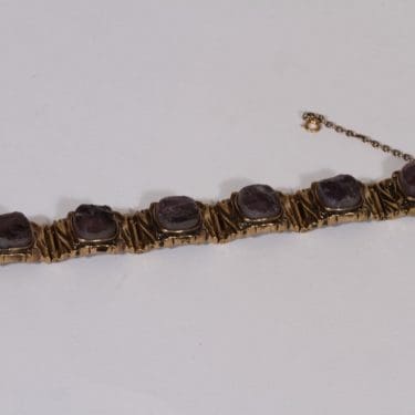 Turun Hopea Kelo rannekoru, pronssi, suunnittelija Pentti Sarpaneva, pronssi, kivellinen, spektroliitti