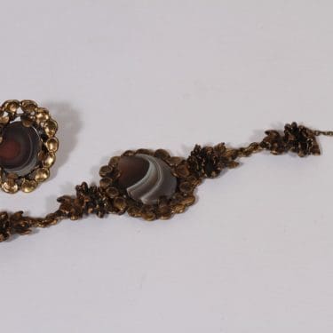 Turun Hopea Akaatti rannekoru ja sormus, pronssi, suunnittelija Pentti Sarpaneva, pronssi, kivellinen, akaatti