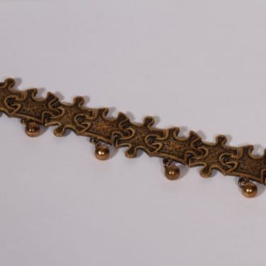 Turun Hopea Palapeli rannekoru, pronssi, suunnittelija Pentti Sarpaneva, pronssi