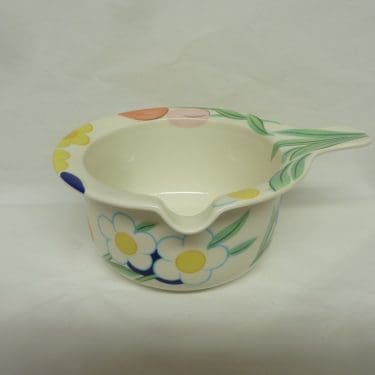 Arabia Arctica Poetica kastikekaadin, suunnittelija Dorrit von Fieandt, serikuva, kukka-aihe