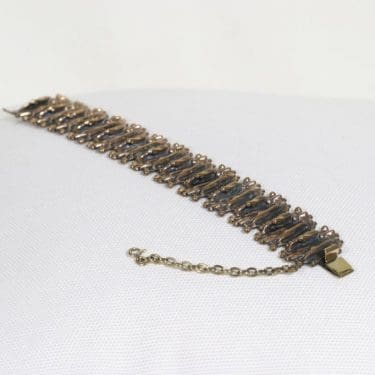 Turun Hopea Kaarna rannekoru, pronssi, suunnittelija Pentti Sarpaneva, pronssi