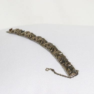 Turun Hopea Kelo rannekoru, pronssi, suunnittelija Pentti Sarpaneva, pronssi