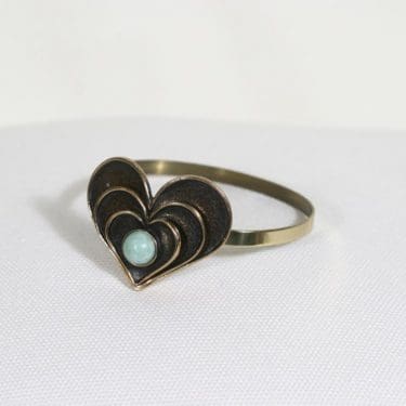 Turun Hopea Sydän rannekoru, pronssi, suunnittelija Pentti Sarpaneva, pronssi