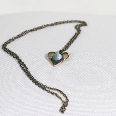 Turun Hopea Sydän riipus/kaulakoru, pronssi, suunnittelija Pentti Sarpaneva, pronssi