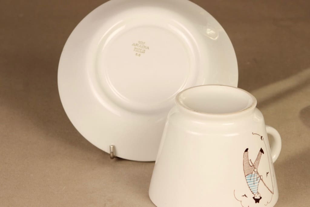 Arabia Harraste kaakaokuppi, Onkija, suunnittelija Raija Uosikkinen, Onkija, kuparipainokoriste kuva 3