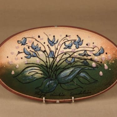 Arabia HLS seinälautanen, Siniset silmät, suunnittelija Heljä Liukko-Sundström, Siniset silmät, tilaustyö